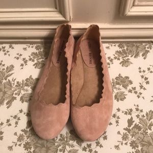 Scallop-edge pink suede flats